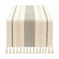 Runner da tavola 180 x 35 cm in tessuto avorio e nero stile boho con frange